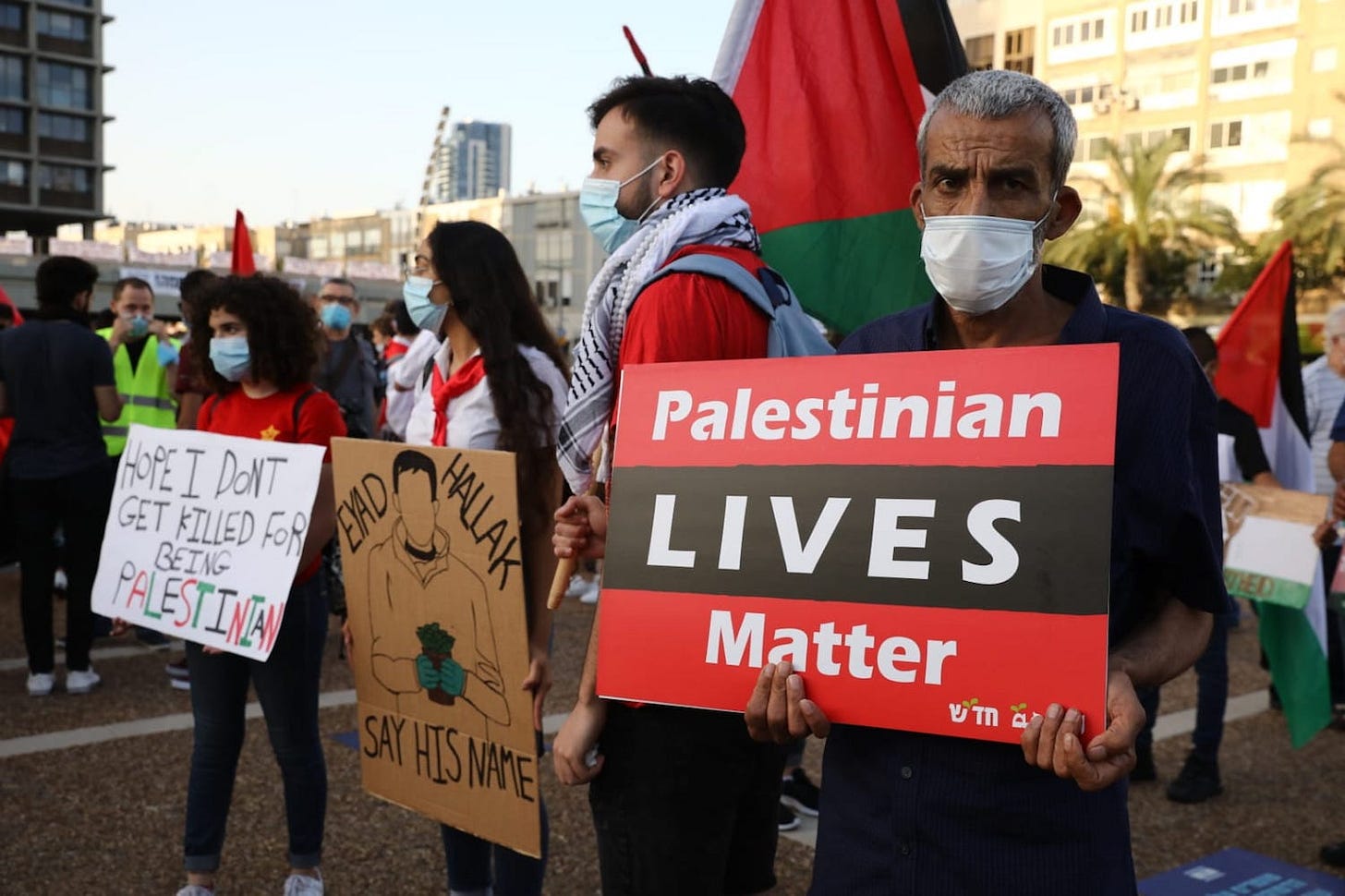 Israeli and Palestinian protesters take part in a demonstration in Rabin Square against the government's annexation plan, Tel Aviv, June 6, 2020. (Oren Ziv)