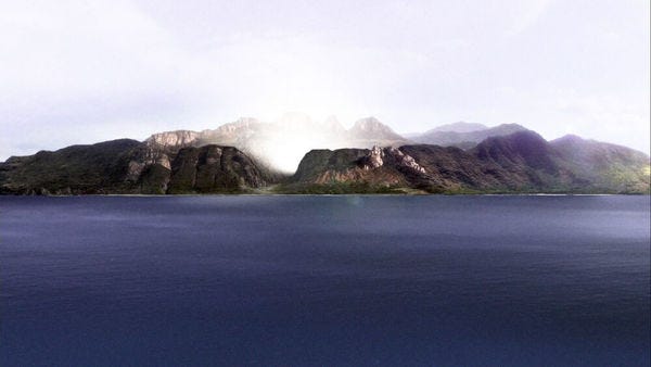 View of the island seen from 1 or 2 miles off shore.