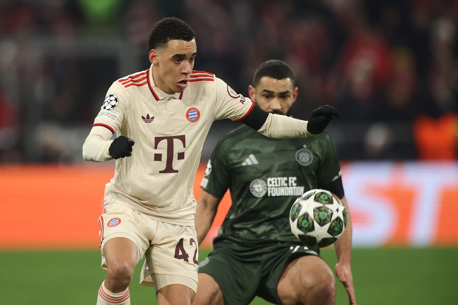 Jamal Musiala controls the ball during Champions League game against Celtic.