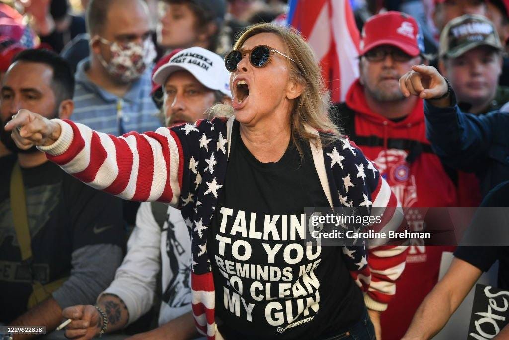 May be an image of 2 people, blonde hair, crowd and text