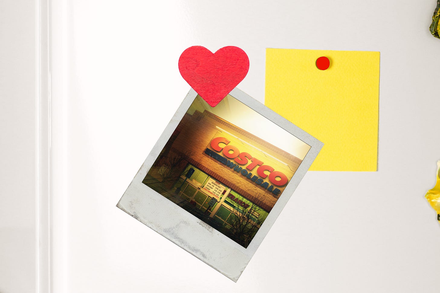 A photo of Costco pinned on a fridge