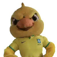 a stuffed animal wearing a yellow shirt with the word brasil on it