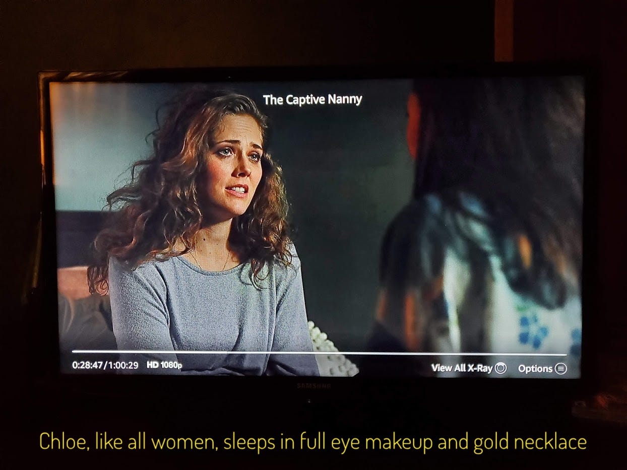A very tired Chloe with very big hair, captioned "Chloe, like all women, sleeps in full eye makeup and gold necklace"
