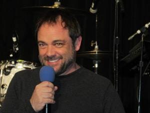 Mark looking devilish. Or king of hell-ish.