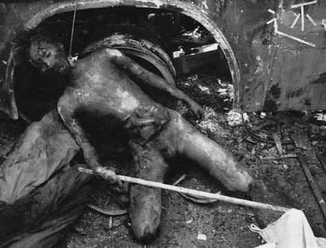 Charred bodies of People's Liberation Army (PLA) soldiers depicted after they were stripped, beaten, and burned to death by "pro-democracy" rioters.