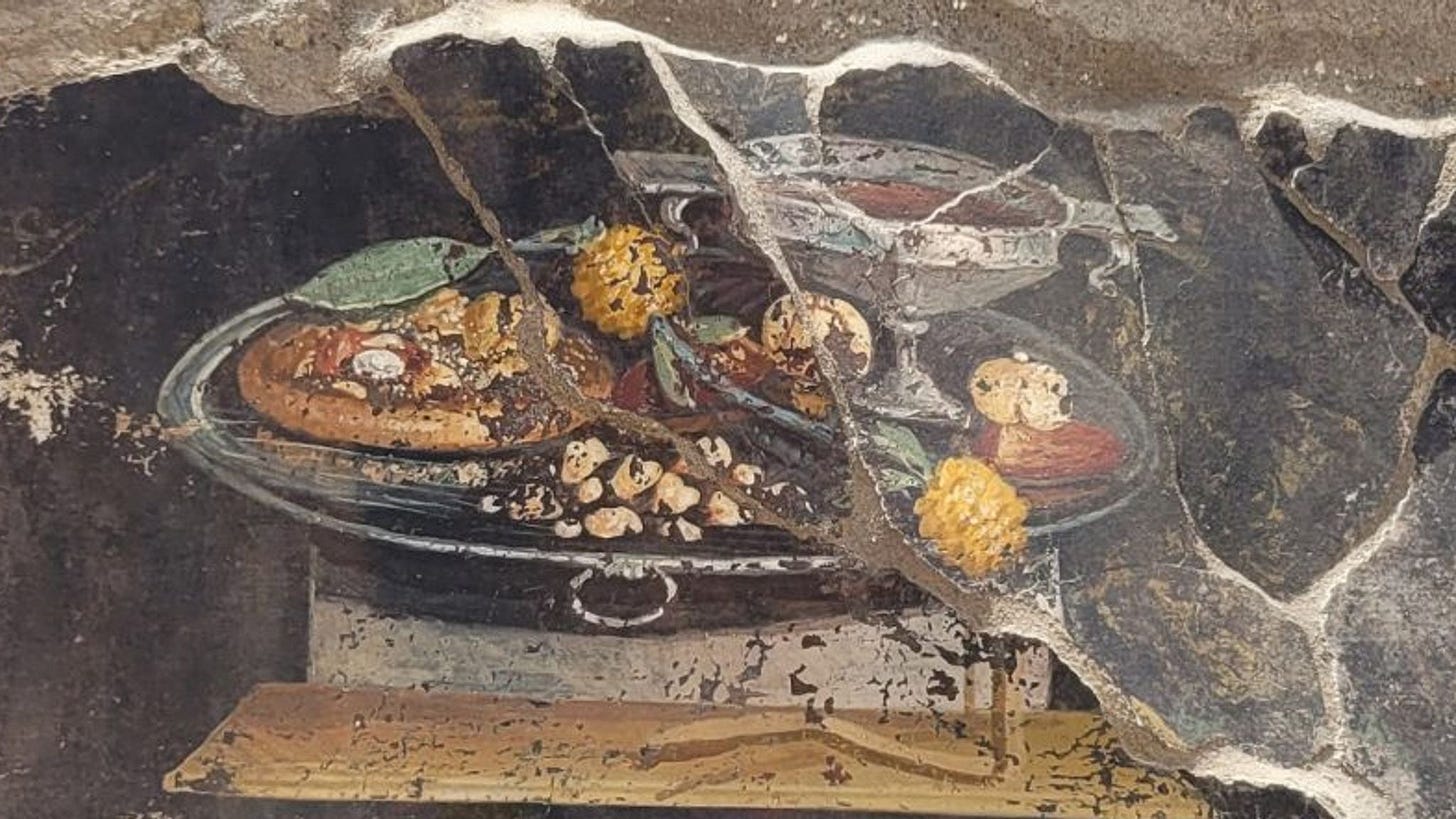 Distant ancestor' to pizza shown in 2,000-year-old painting - but toppings  are a little different | Offbeat News | Sky News Distant ancestor' to pizza shown in 2,000-year-old painting - but toppings  are a little different | Offbeat News | Sky News