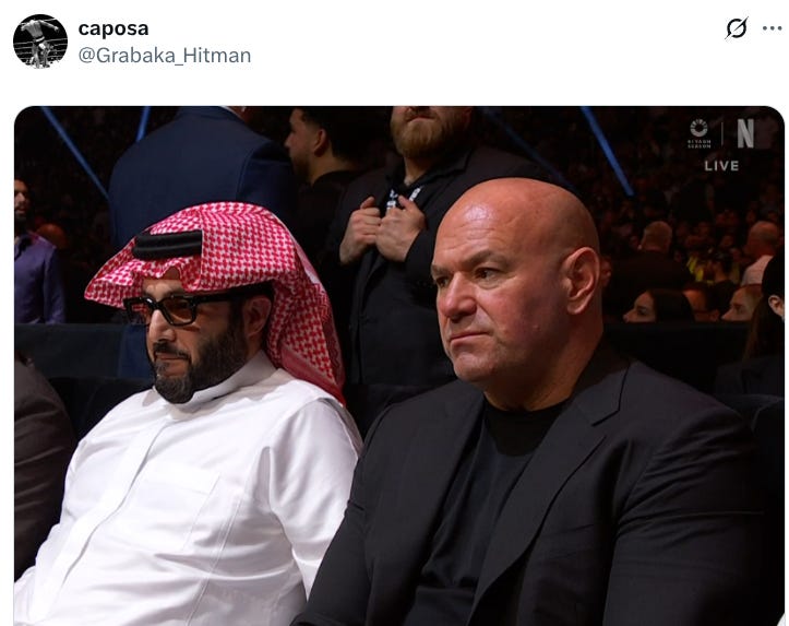 Photo: Turki Alalshikh and Dana White sitting next to one another with grim looks on their faces.