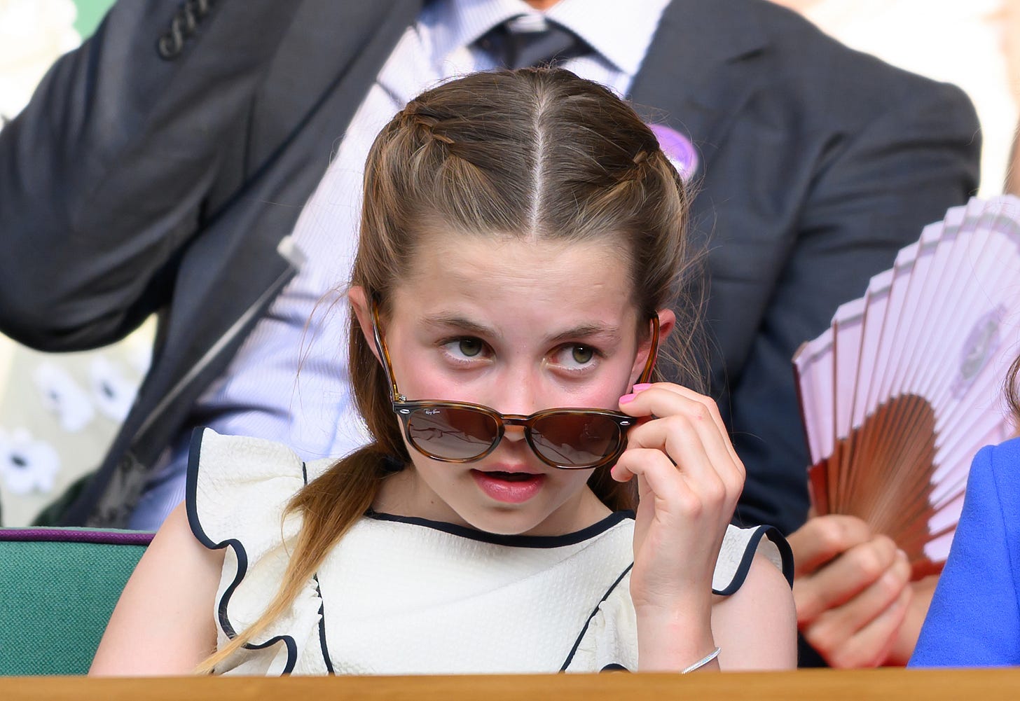Princess Charlotte with her sunglasses tipped slightly down Princess Charlotte with her sunglasses tipped slightly down