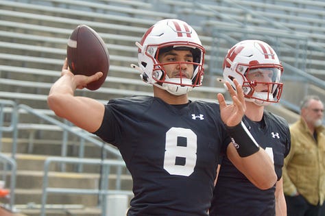 Wisconsin quarterbacks participate in individual position drills during Saturday's spring practice inside Camp Randall Stadium.