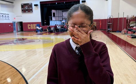 A young actress tries to stop smiling to portray the gloomy Wednesday Addams in the musical "The Addams Family."