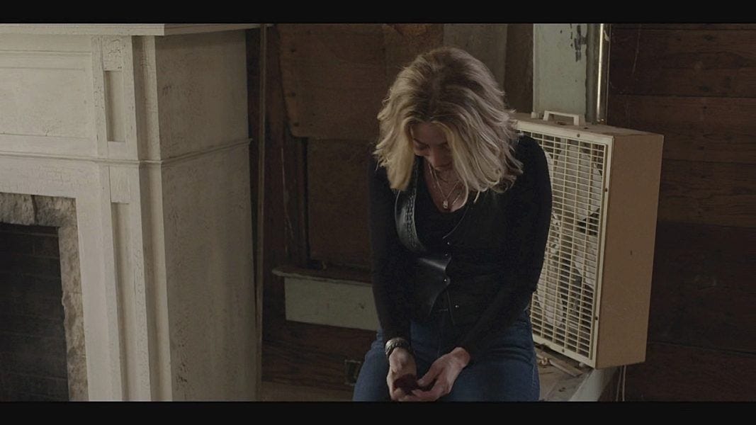 Walker Sharon Lawrence sitting in front of white trash fan 4.10. Walker Sharon Lawrence sitting in front of white trash fan 4.10.