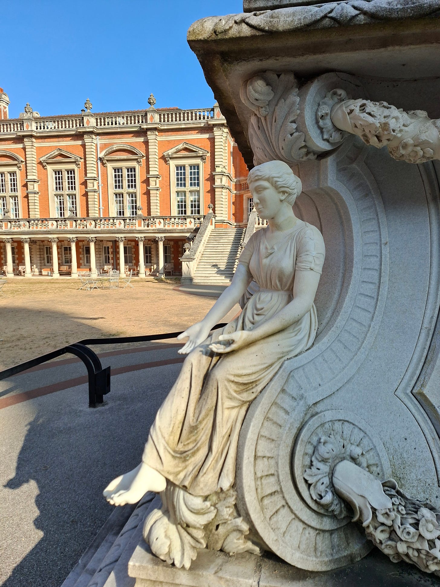 marble statue of a woman staring into space