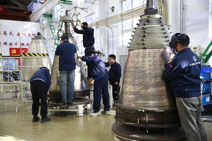 Parts of various YF-75 engines during production.