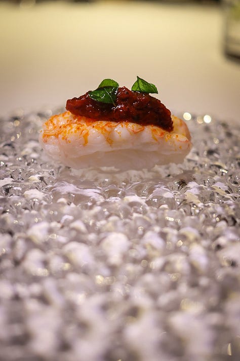 First to last: langoustine nigiri, Milanese nigiri and squid lardo