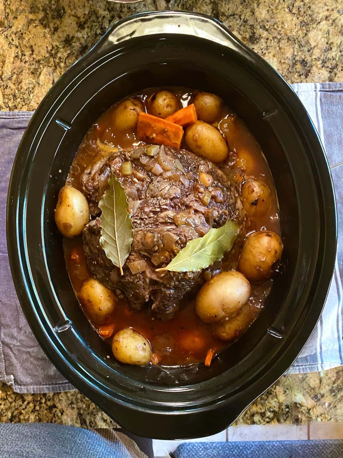 crock pot filled with yankee pot roast.