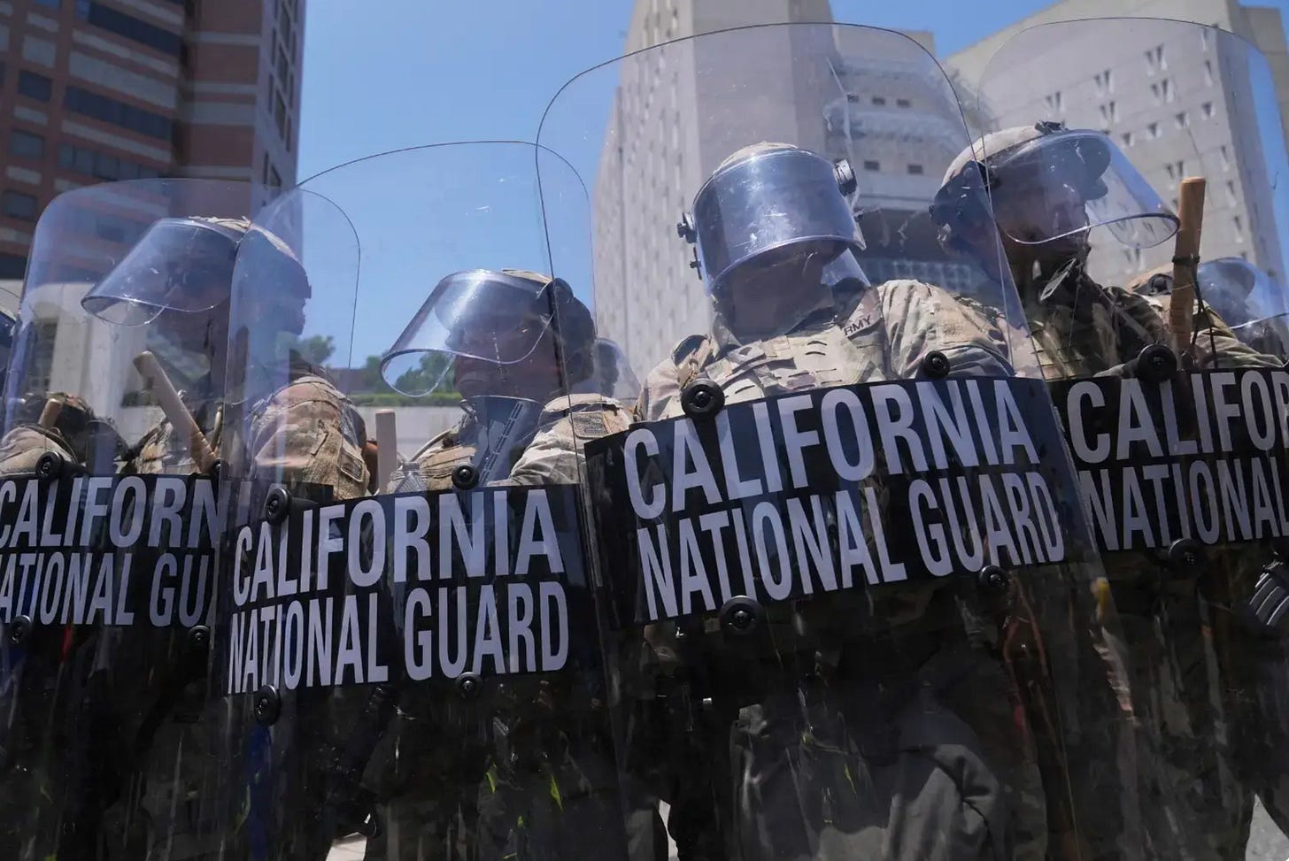 group of CA national guard with shields