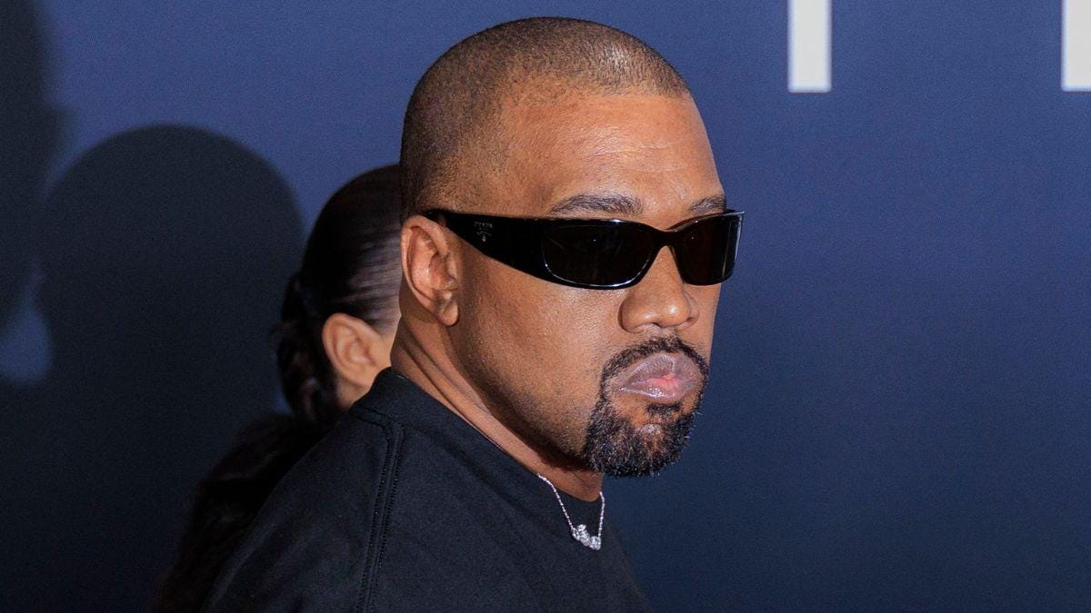 Photo of Kanye West. Photo of Kanye West.