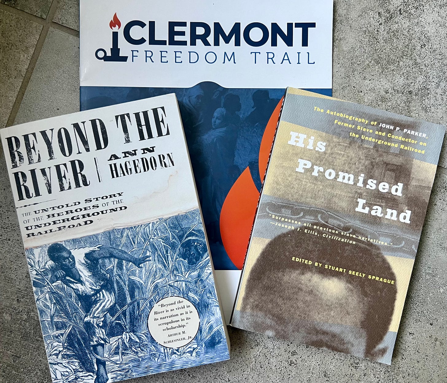 L-R: book "Beyond the River," brochure for Clermont Freedom Trail, and book "His Promised Land" L-R: book "Beyond the River," brochure for Clermont Freedom Trail, and book "His Promised Land"