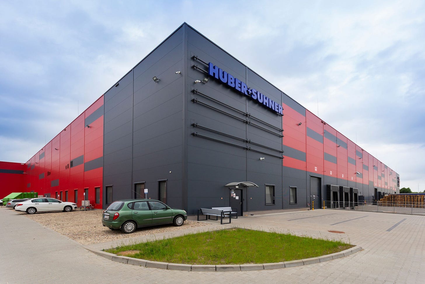 Unsere Unternehmensgeschichte - HUBER+SUHNER