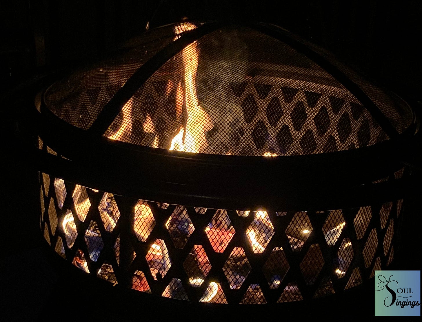 Hello September: a bonfire in a metal cage