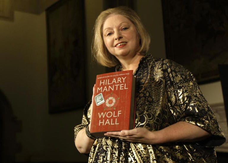 Hilary Mantel with their book 'Wolf Hall' in 2009 after she won the Booker Prize. ©AP Photo/ Alastair Grant, File