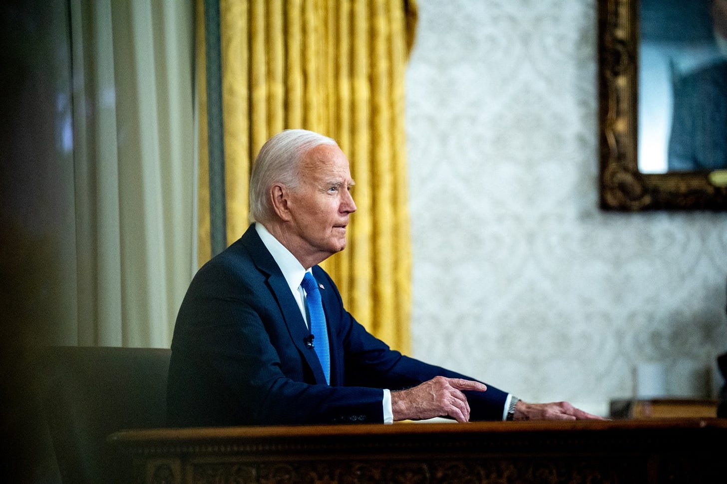 WASHINGTON, DC - JULY 24: U.S. President Joe Biden speaks during an address to the nation about his decision not to seek reelection in the Oval Office at the White House on July 24, 2024 in Washington, DC. Biden abandoned his campaign for a second term after weeks of pressure from fellow Democrats to withdraw and just months ahead of the November election, throwing his support behind Harris. (Photo by Andrew Harnik/Getty Images) WASHINGTON, DC - JULY 24: U.S. President Joe Biden speaks during an address to the nation about his decision not to seek reelection in the Oval Office at the White House on July 24, 2024 in Washington, DC. Biden abandoned his campaign for a second term after weeks of pressure from fellow Democrats to withdraw and just months ahead of the November election, throwing his support behind Harris. (Photo by Andrew Harnik/Getty Images)