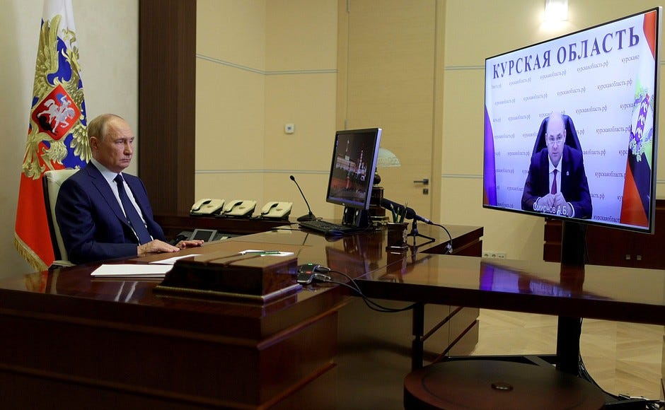 PHOTO: President Vladimir Putin talks with the governor of Kursk on the situation regarding the Ukrainian invasion of the south of the oblast. The Russian Presidential Press and Information Office / kermlin.ru.