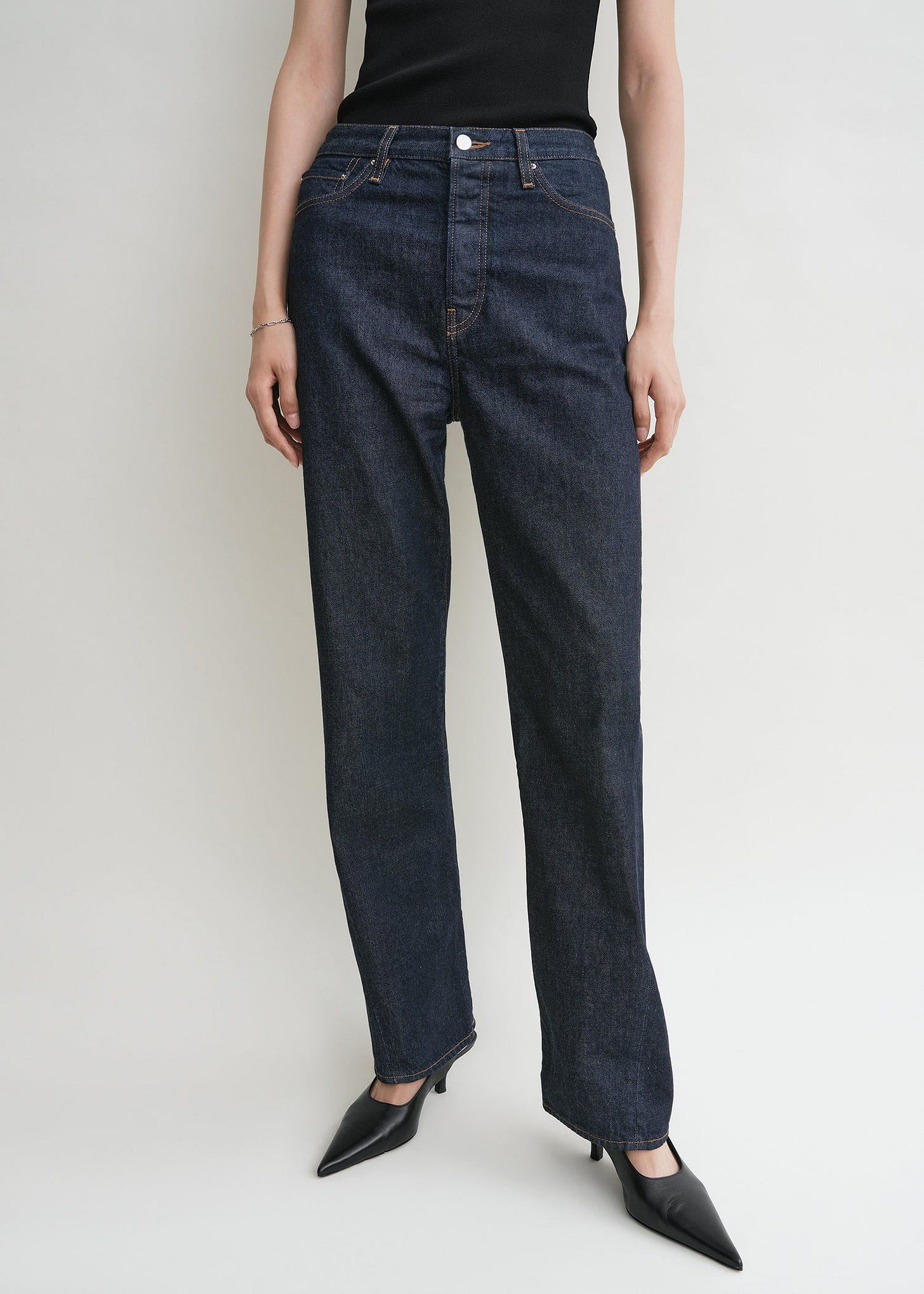 Twisted seam denim full length rinsed blue