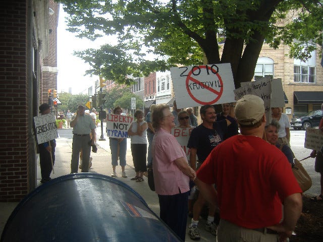 The protestors are gathered in front of Congressman Frank Kratovil's Salisbury regional office. They had the occasional honk from Main Street traffic. The protestors are gathered in front of Congressman Frank Kratovil's Salisbury regional office. They had the occasional honk from Main Street traffic.