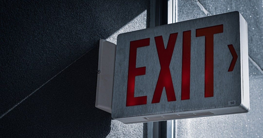 white and red no smoking sign