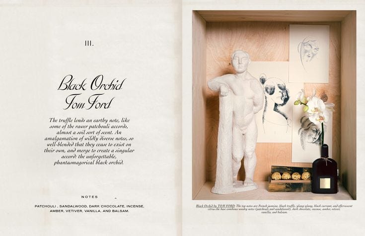 This may contain: an open book with a statue and bottle in it
