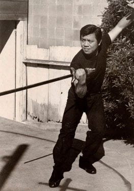 George Long with Sword of the Western Hemisphere_old Geary St school circa 1970.jpg