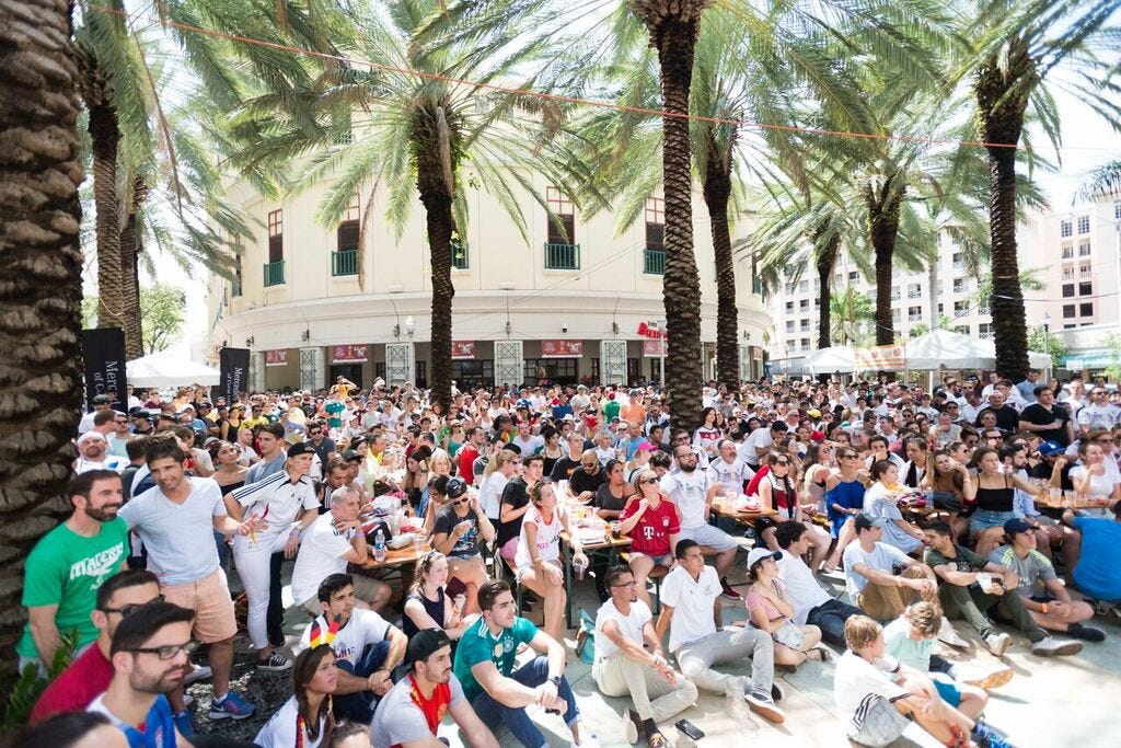 May be an image of one or more people, crowd and text