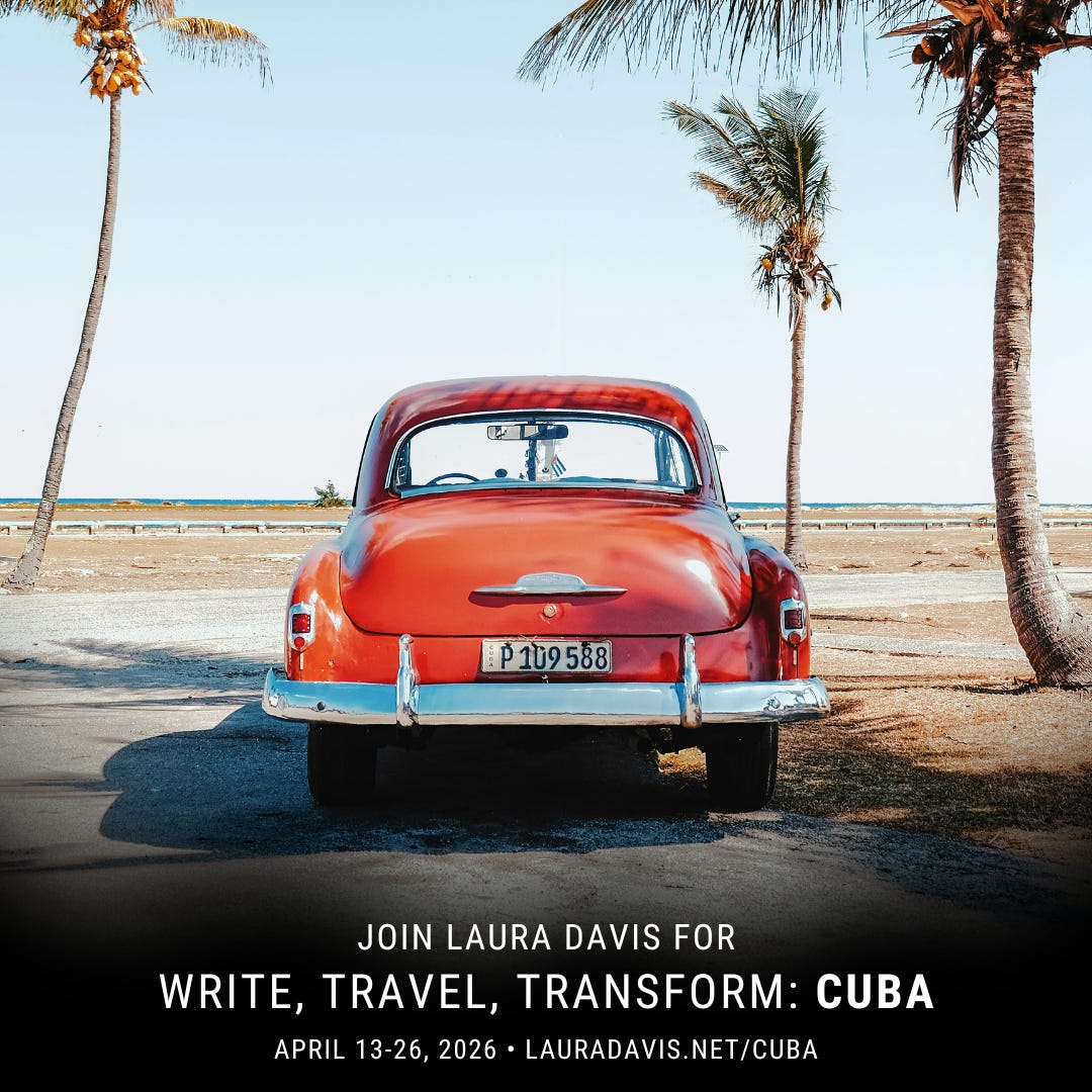 old fashioned red sedan in Cuba on the beach