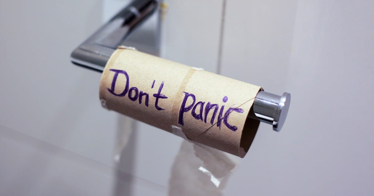 Empty toilet paper roll reading "Don't Panic" Empty toilet paper roll reading "Don't Panic"