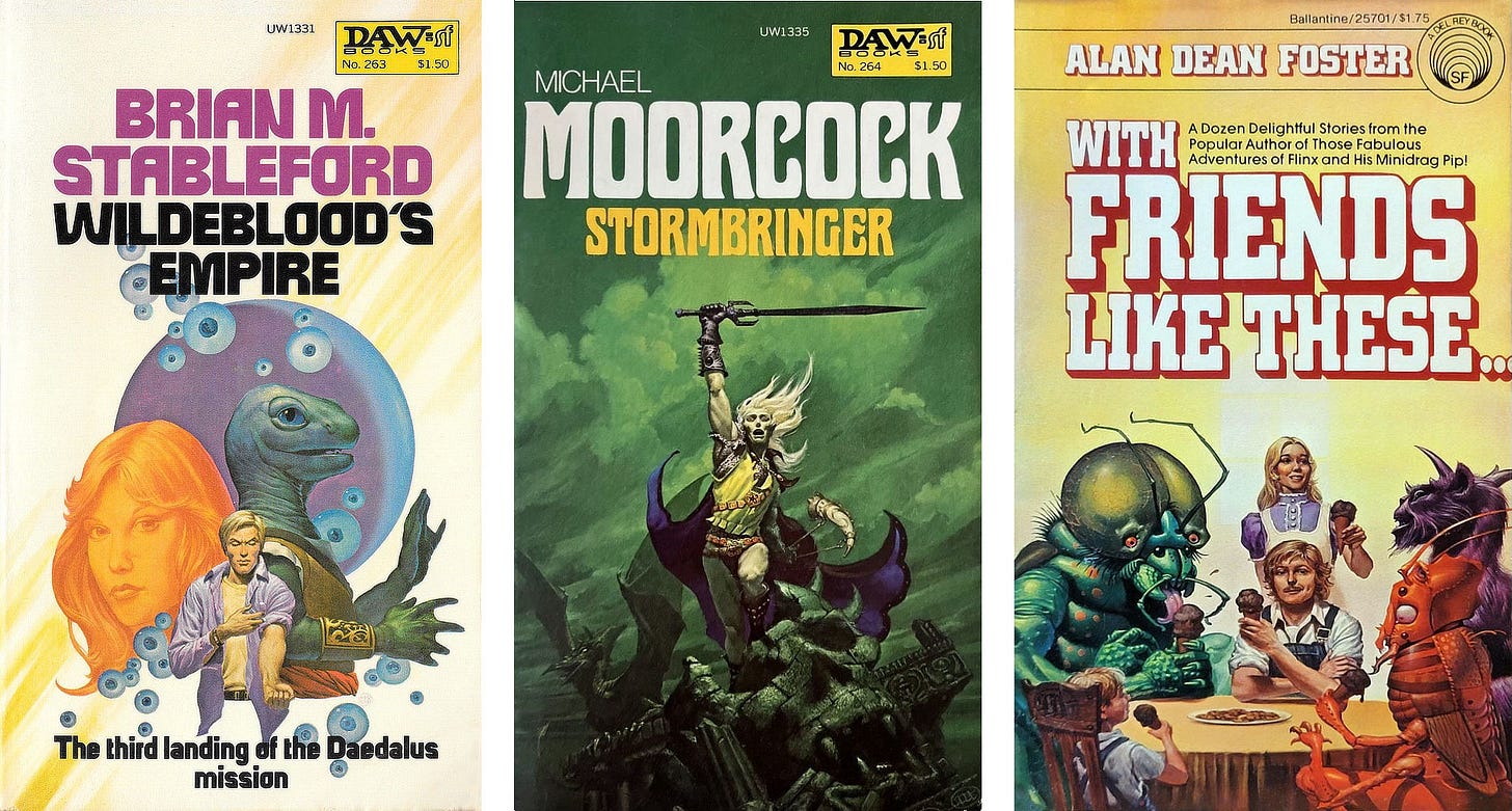 Three paperback covers side-by-side: WILDEBLOOD’S EMPIRE by Brian M. Stableford, published by DAW Books, STORMBRINGER by Michael Moorcock, published by DAW Books, and WITH FRIENDS LIKE THESE by Alan Dean Foster, published by Del Rey Books.