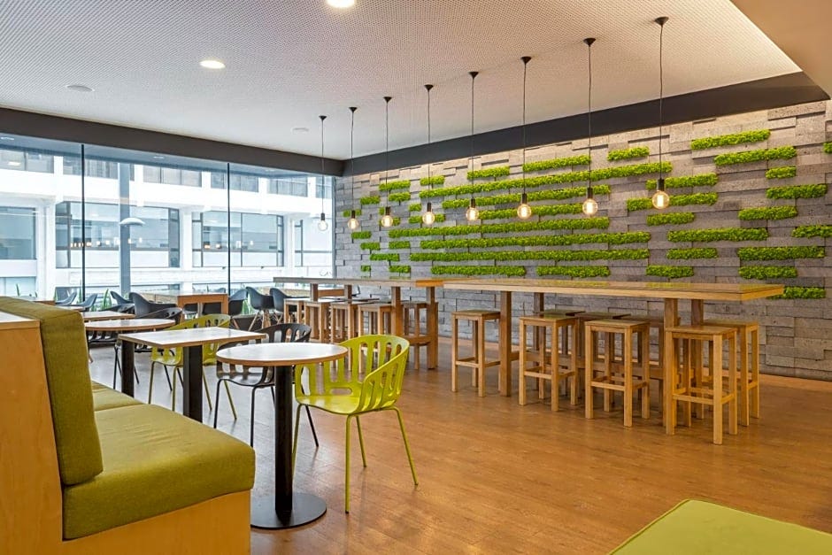 bright lobby and breakfast area at NEAT Hotel Avenida in Ponta Delgada