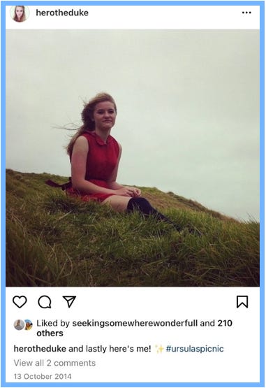 Hero posts an image of herself on the side of a maunga. Grass creeps up around her legs, and the grey sky arcs around her head. Her hair is blowing behind her, she sits in a red dress. Text reads: and lastly here's me! [sparkle emoji] #ursulaspicnic