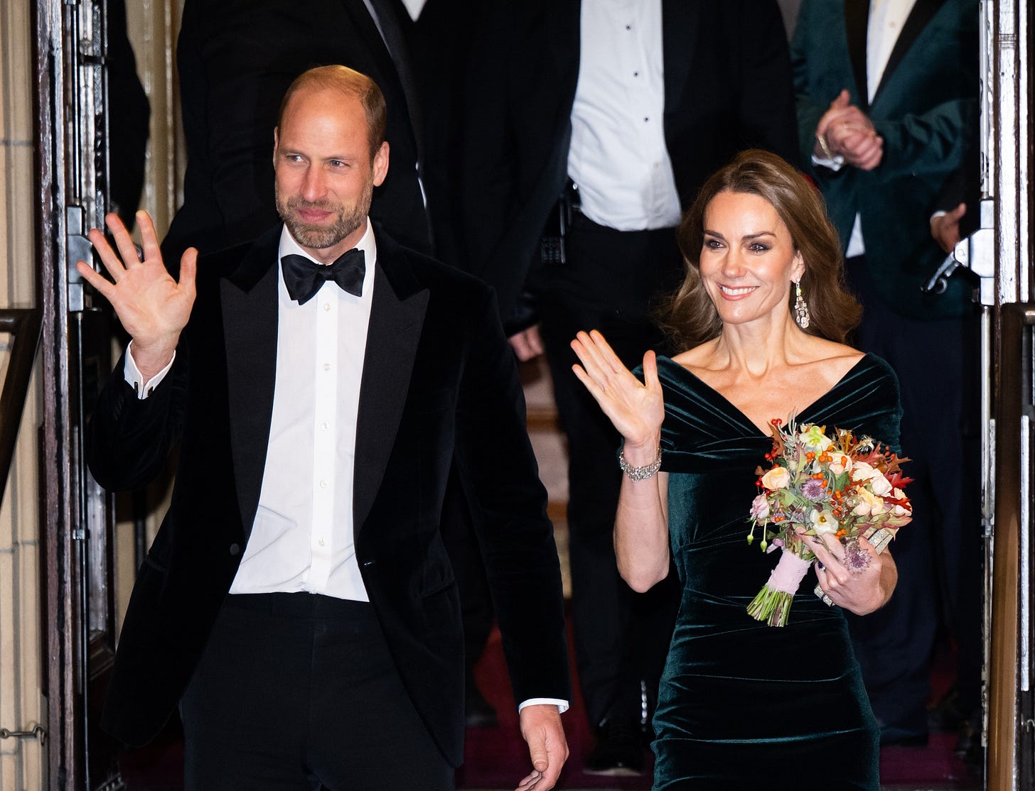Prince William and Princess Catherine waving