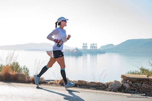 Anna Brown running along the coast during the Spartathlon