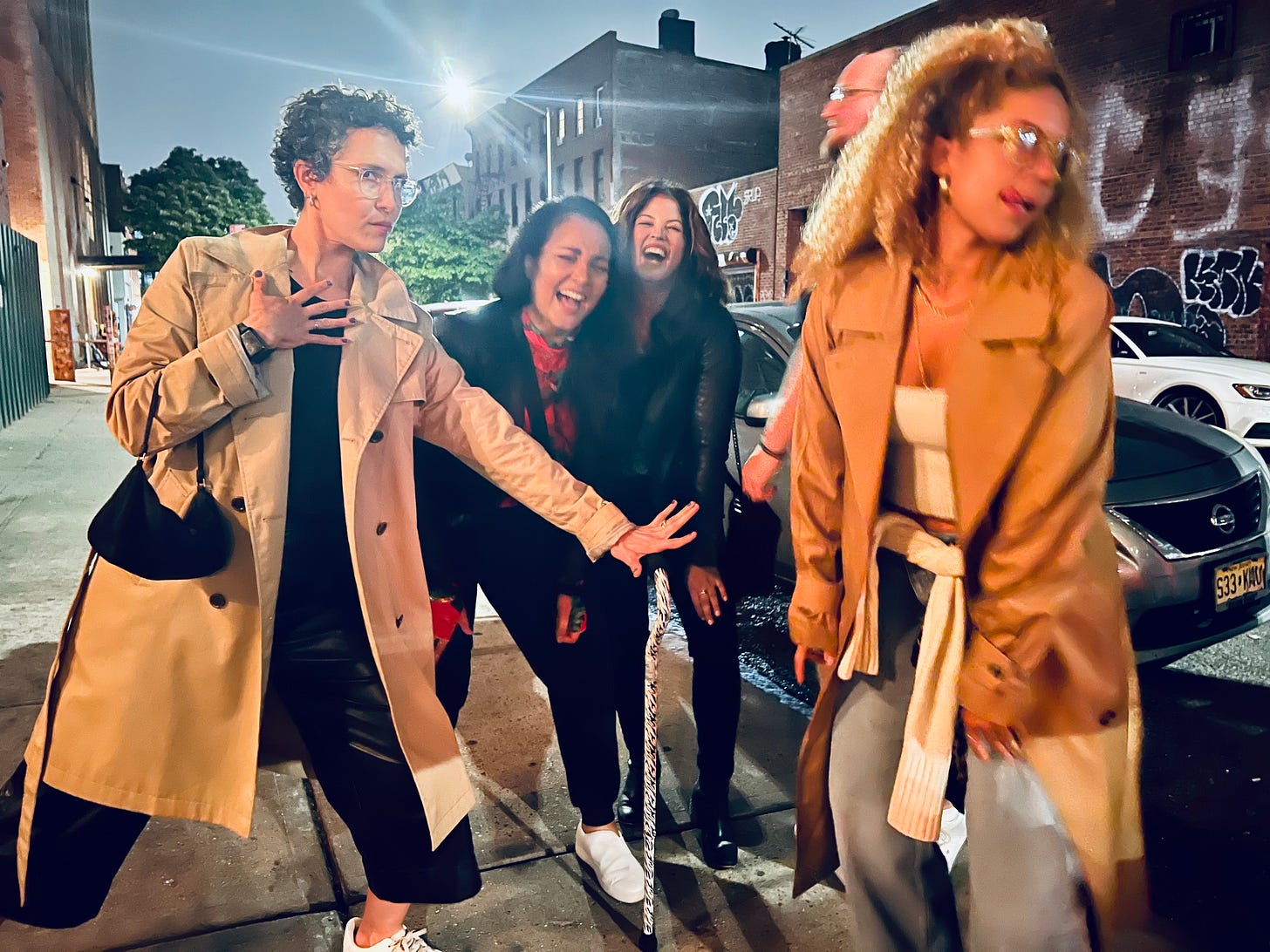 marianna and friends laughing into the camera