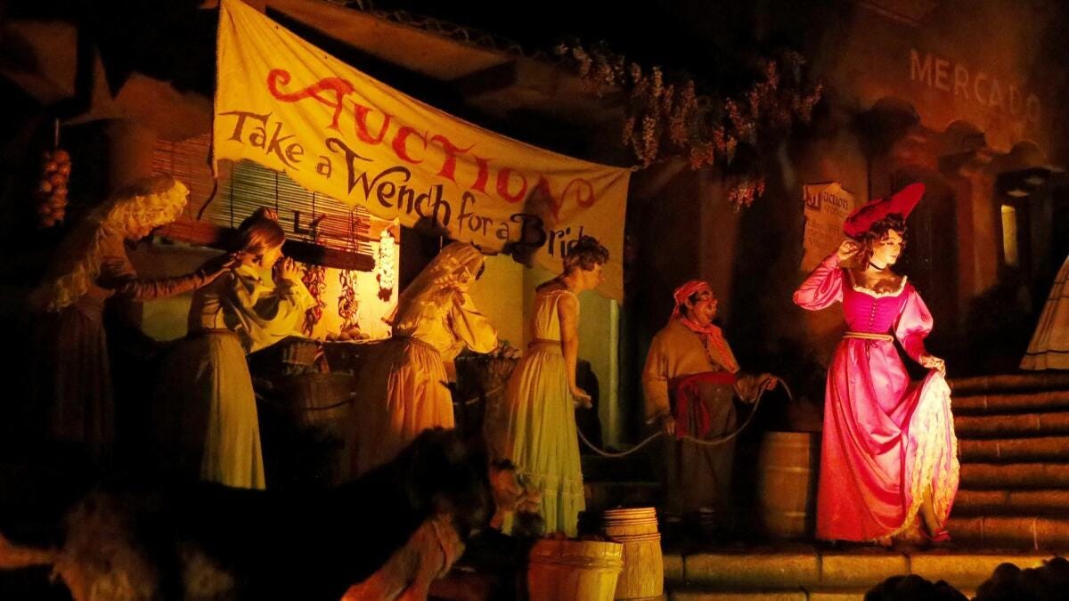 The Pirates of the Caribbean bride auction scene in 2017 before the transformation of the lady in red to Redd the female pirate. The Pirates of the Caribbean bride auction scene in 2017 before the transformation of the lady in red to Redd the female pirate.