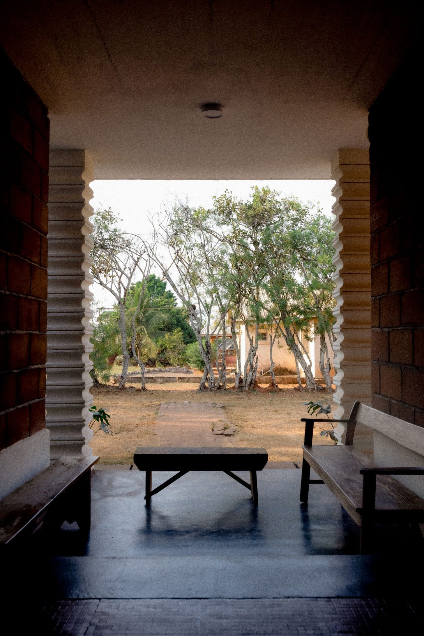 Image may contain Bench Furniture Architecture Building Hotel Resort Indoors Interior Design and Wood