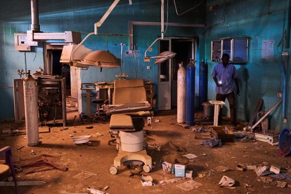 A guard walks through a war-damaged section of Al Shaabi Hospital in Khartoum, Saturday, April 18, 2026. (AP Photo/Bernat Armangue) A guard walks through a war-damaged section of Al Shaabi Hospital in Khartoum, Saturday, April 18, 2026. (AP Photo/Bernat Armangue)