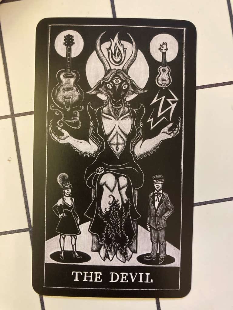 The Devil card for Devil May Care from the Charming Disaster Oracle Deck, illustrated by Madame Onça The Devil card for Devil May Care from the Charming Disaster Oracle Deck, illustrated by Madame Onça