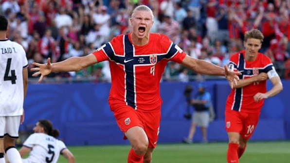 Erlinrg Haaland after scoring a goal against Iraq in World Cup match.