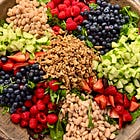 Triple berry summer salad with a simple lemon dijon vinaigrette