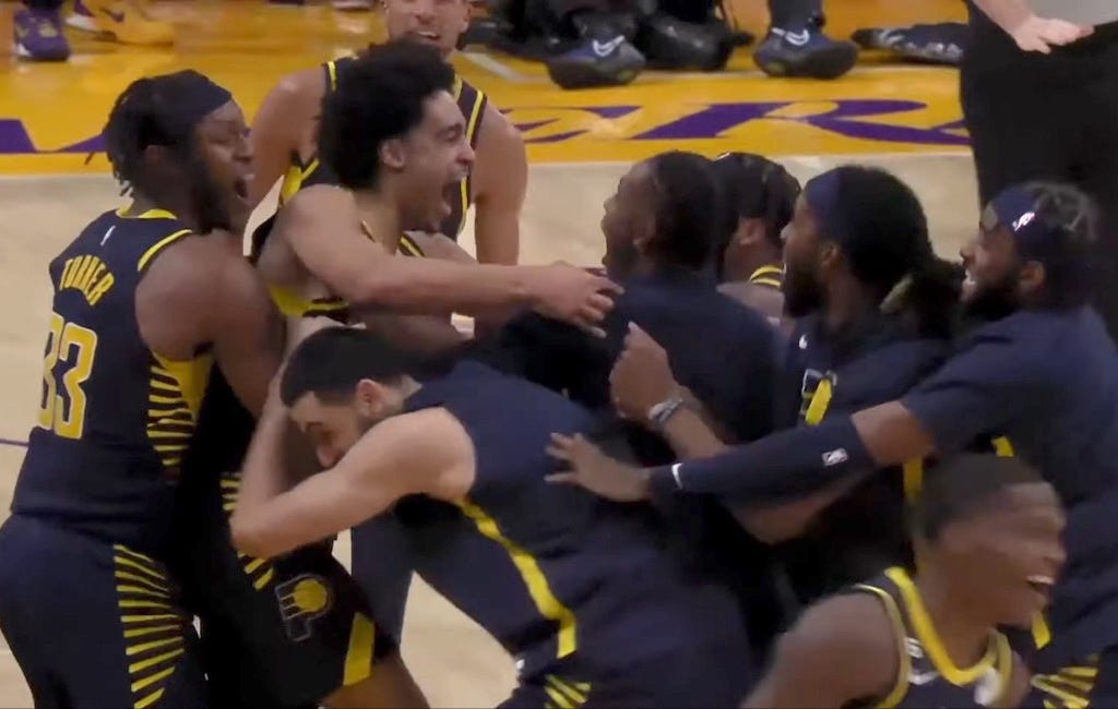 Andrew Nembhard was mobbed by his teammates after sinking the game-winning 3-pointer to beat the Lakers. Andrew Nembhard was mobbed by his teammates after sinking the game-winning 3-pointer to beat the Lakers.