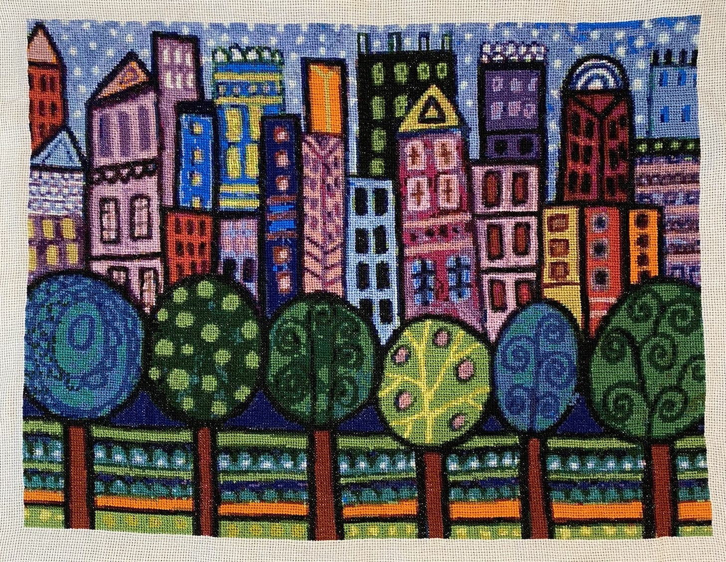 Colorful cross stitch of NYC