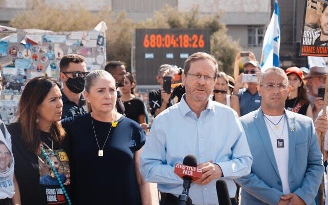 President Isaac Herzog and his wife, Michal, appear in Hostages Square in Tel Aviv as part of a nationwide protest, August 17, 2025. (President's Office)